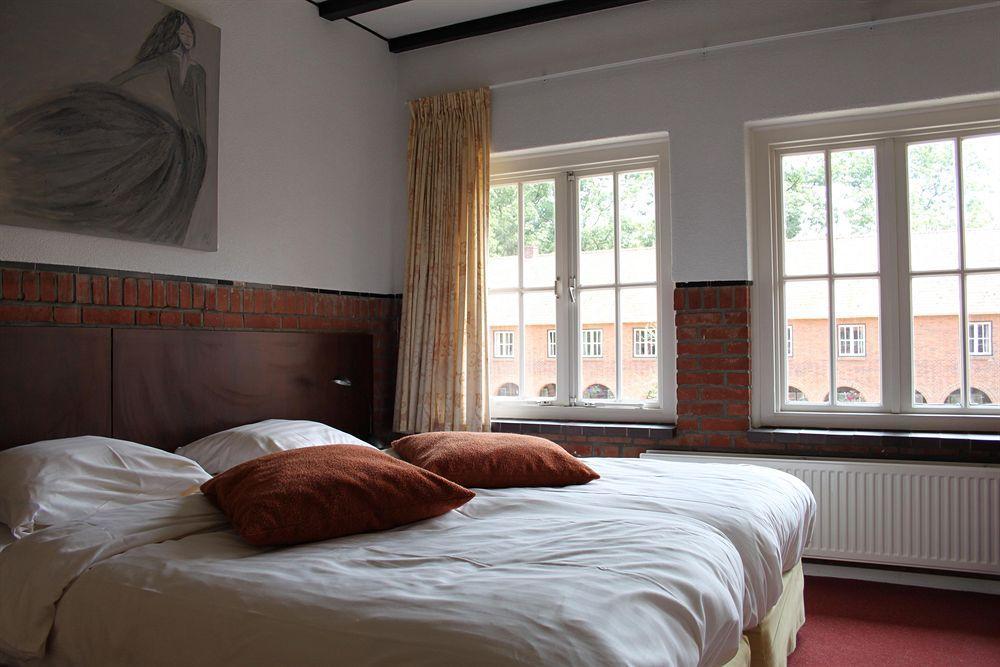 Hotel De Volksabdij Ossendrecht Rom bilde