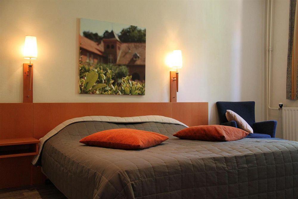 Hotel De Volksabdij Ossendrecht Rom bilde
